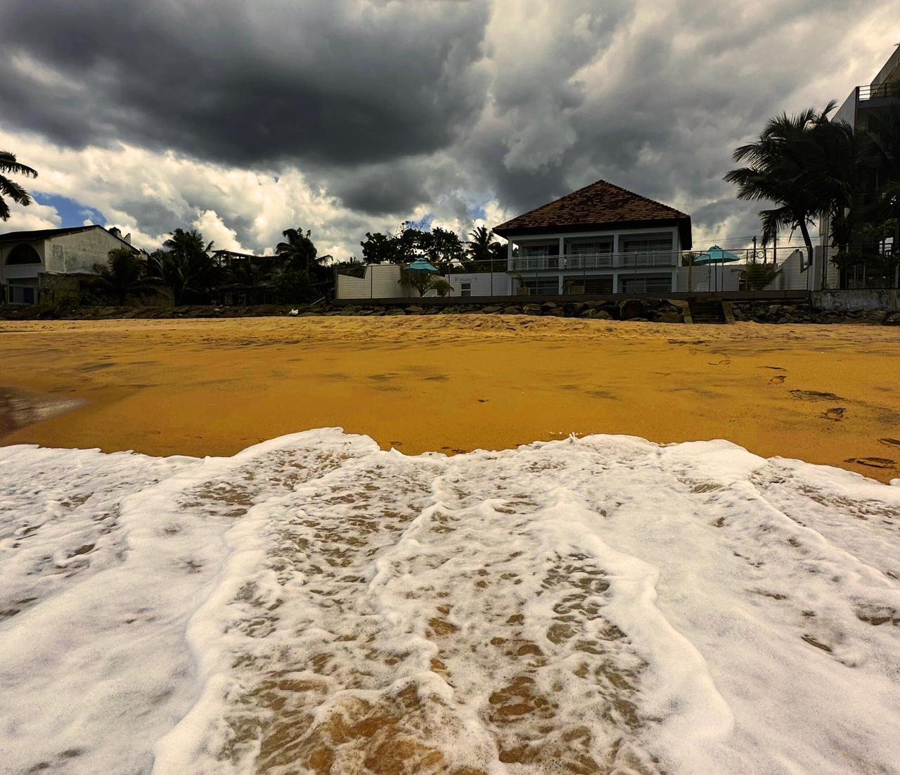Infinity pool with panoramic valley views at Breeze and Tide